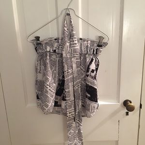 Newspaper print paper bag shorts